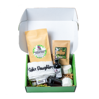 "Outcold Virus Box by Sebi's Daughters, featuring seamoss elderberry capsules, eucalyptus shower balms, Honduran tea, 2oz elderberry plus, eucalyptus chest rub, seamoss lip balm, and a Sebi’s Daughters washcloth."