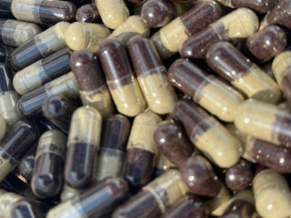 30-count bottle of Sebi's Daughters Seamoss and Elderberry Capsules, featuring organic seamoss and elderberry for daily wellness support in a vegetable cellulose capsule